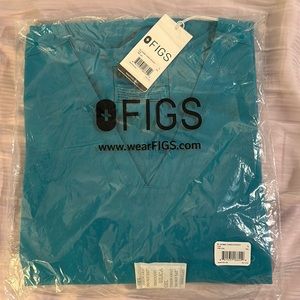 Figs teal scrub top.